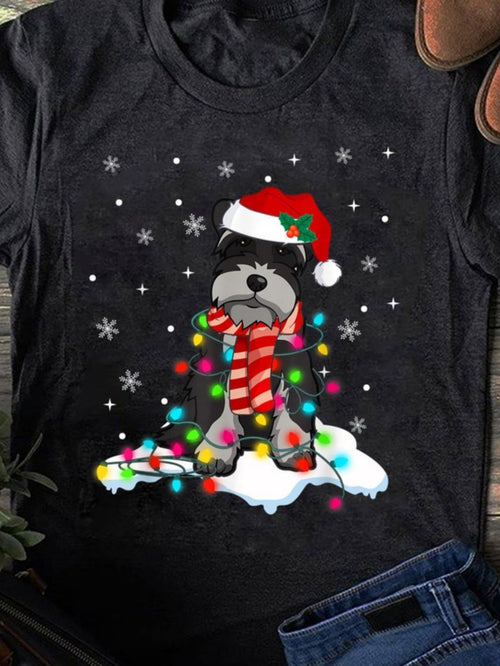 Men's Graphic T-Shirt Festive Snowy Night With Dog Wearing Holiday Hat Wrapped In Colorful Lights
