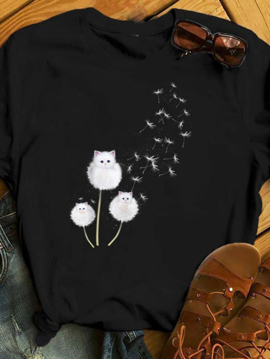 Women's Graphic T-Shirt Whimsical Dandelion Fluff With Playful White Cat On Black Shirt