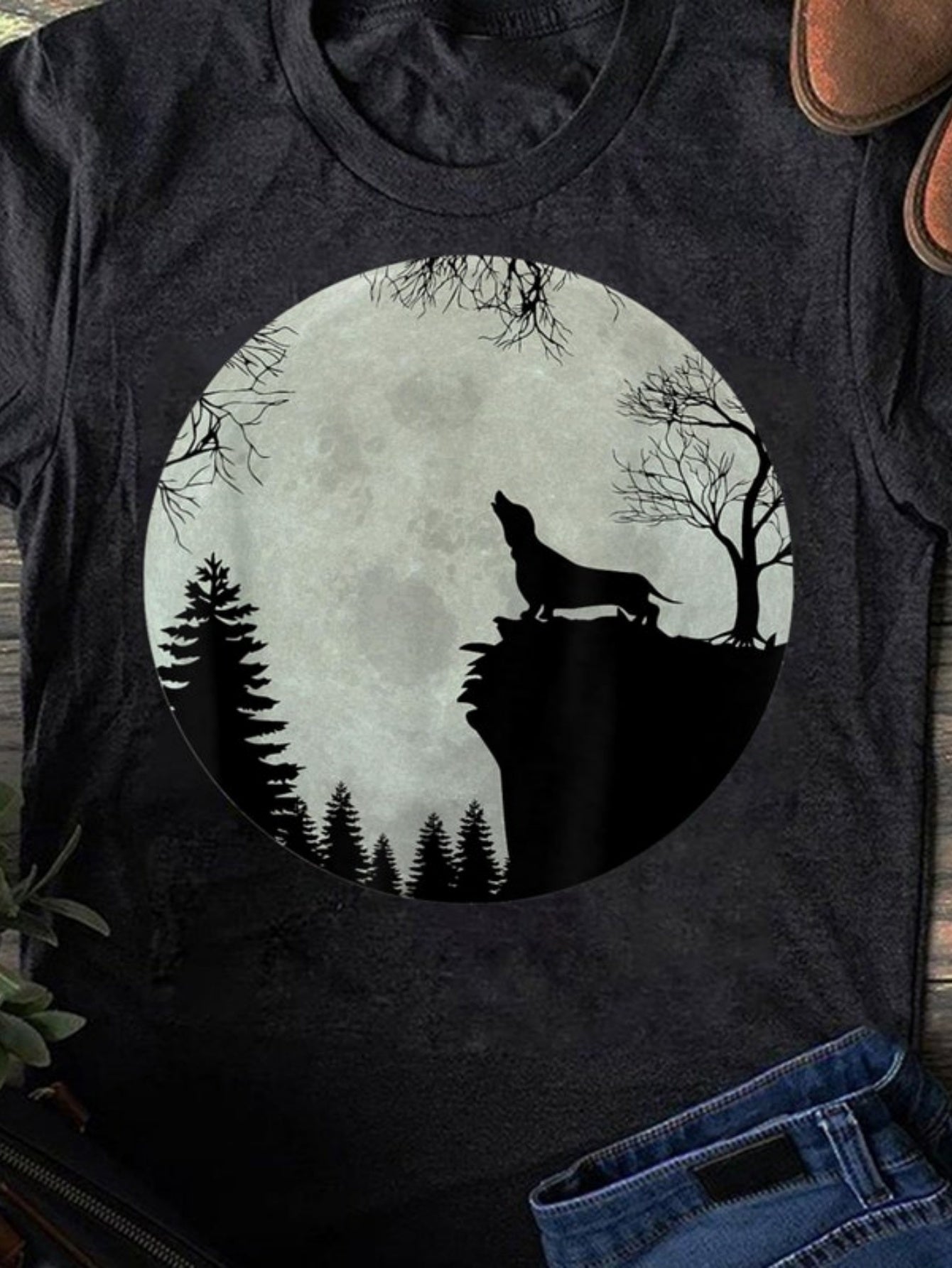 Men's Graphic T-Shirt Howling Wolf Silhouetted Under Full Moon With Pine Trees And Cliffside Forest