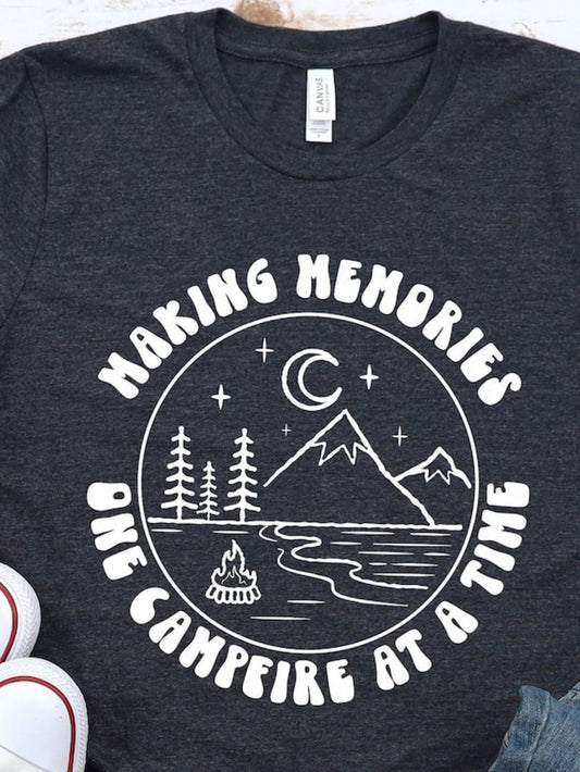 Men's Graphic T-Shirt Making Memories Under Crescent Moon Beside River With Pine Trees And Campfire Mountain
