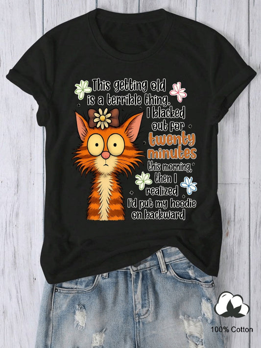 Women's Graphic T-Shirt This Getting Old Is A Terrible Thing I Blacked Out For Twenty Minutes This Morning Then I Realized Id Put My Hoodie On Backward Wide Eyed Orange Striped Feline With Small Daisy Flower Adorned Cat